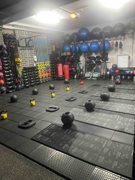 Missfit PT & Fitness gym setup with neatly arranged fitness equipment.