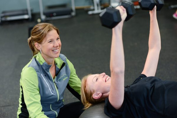 Two women working out together in a personal fitness session at Misfit PT & Fitness