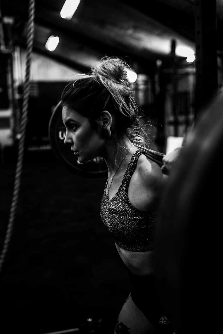 Mind-Body Connection through Reformer Pilates at Misfit PT & Fitness Woman working out enhancing mind-body connection at Misfit PT & Fitness