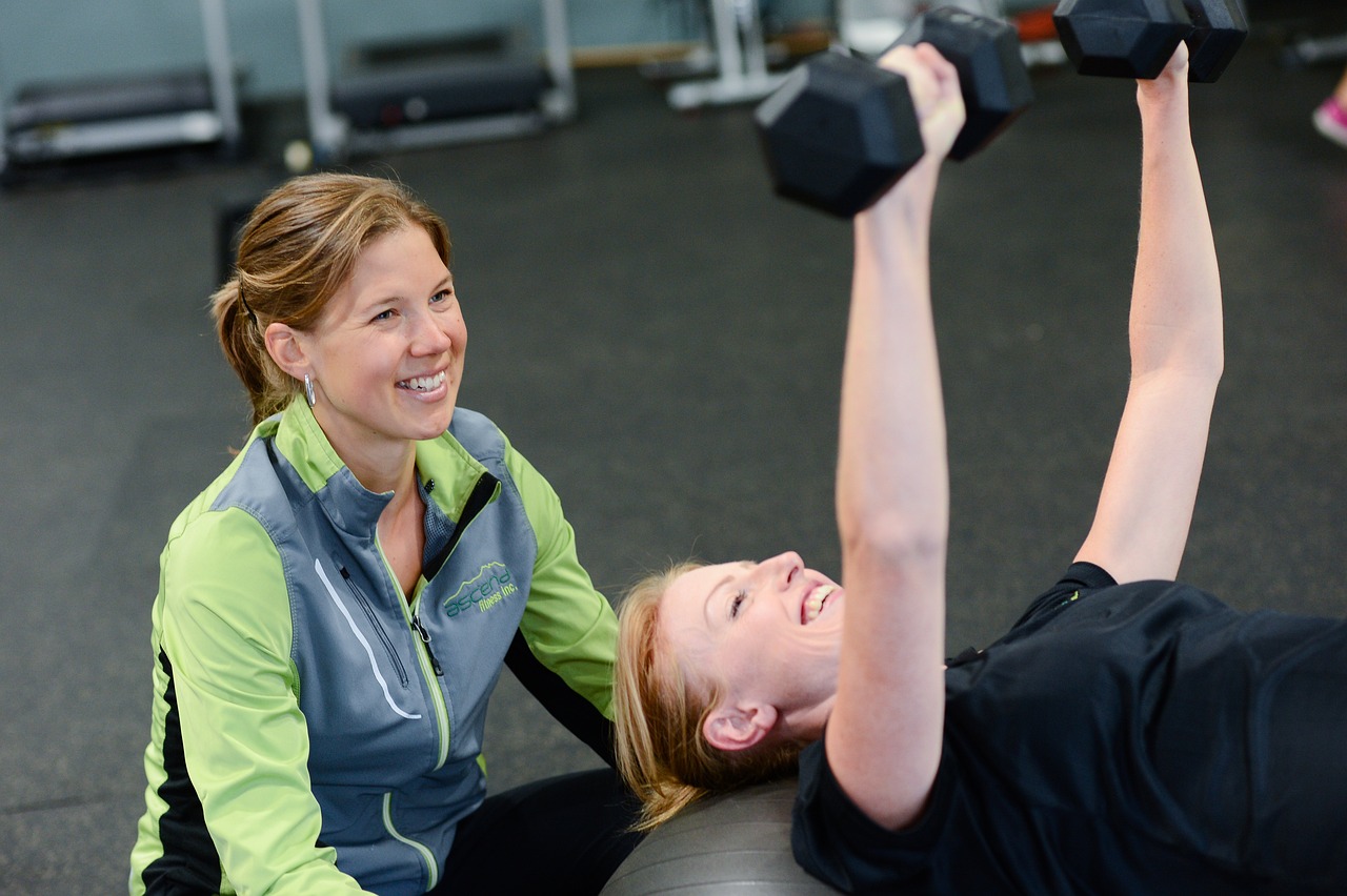 Two women working out together in a personal fitness session at Misfit PT & Fitness