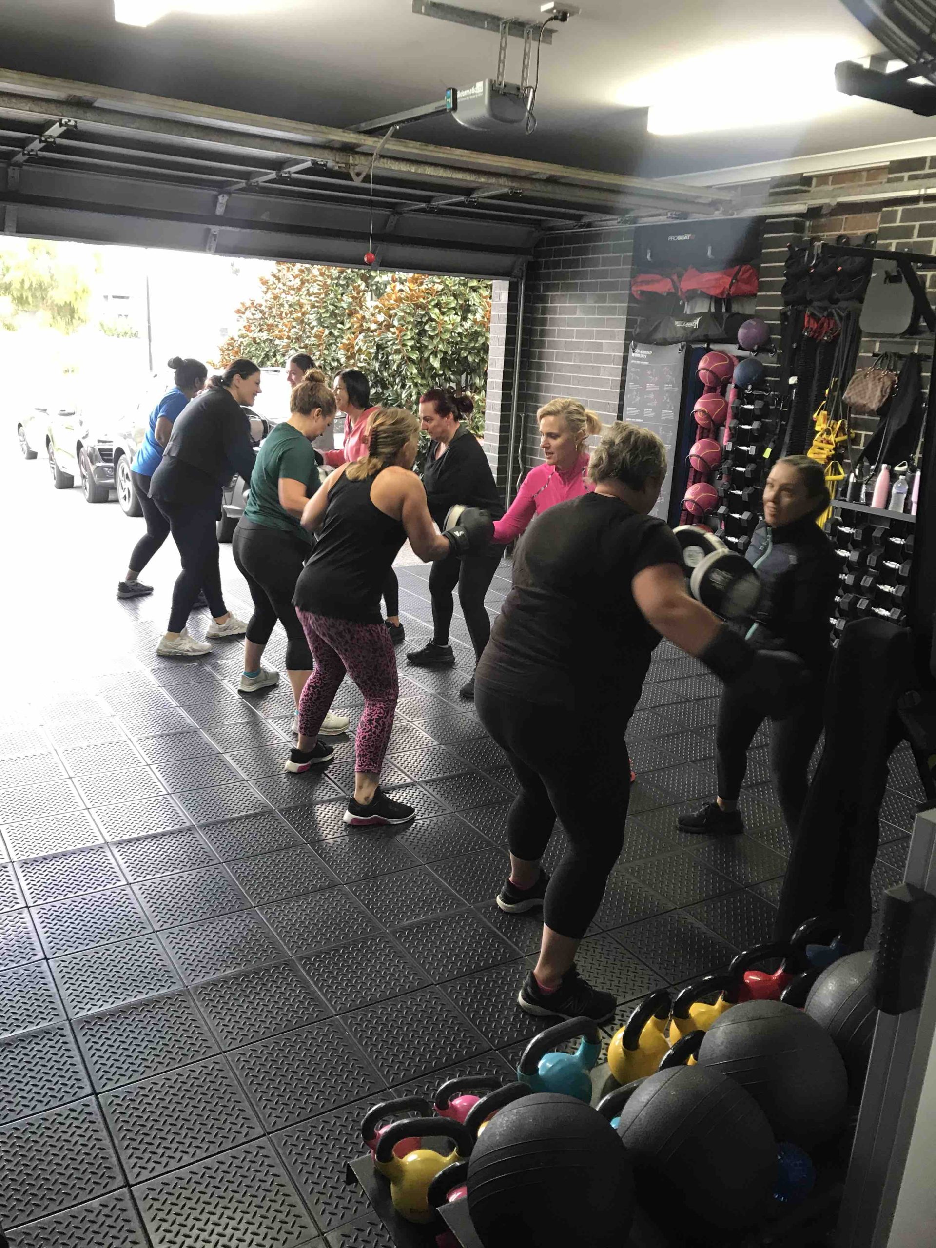 Group Fitness Sessions at Misfit PT & Fitness Group of women working out during a group fitness session at Misfit PT & Fitness